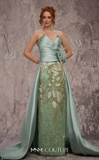 MNM Couture Style J03497 strapless column gown with a beaded skirt, satin train, and asymmetrical deep V-neck. \ Couture Shop LA