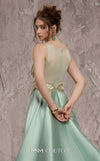 MNM Couture Style J03503 beaded column gown with a double skirt train and sheer neckline. \ Couture Shop LA
