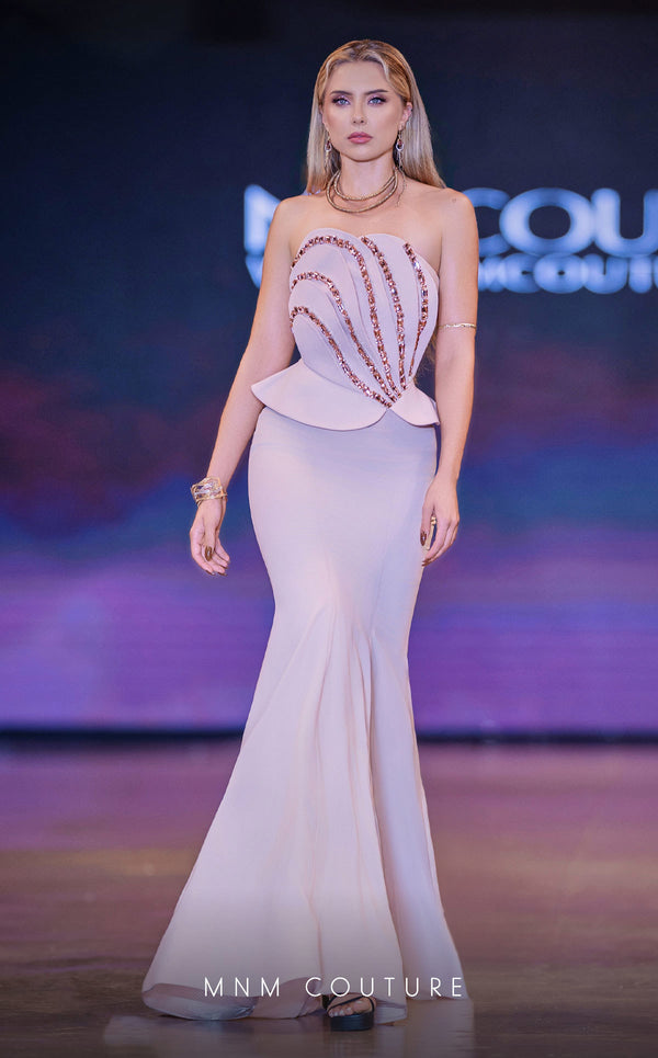 MNM Couture Style J03571 strapless mermaid gown with a corset top, crystal embellishments, and peplum details. \ Couture Shop LA