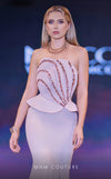 MNM Couture Style J03571 strapless mermaid gown with a corset top, crystal embellishments, and peplum details. \ Couture Shop LA