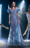 MNM Couture K3963 gown with off-shoulder sleeves, corset-boned bodice, and dramatic cascading ruffles. | Couture Shop LA