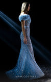 MNM Couture K3963 gown with off-shoulder sleeves, corset-boned bodice, and dramatic cascading ruffles. | Couture Shop LA