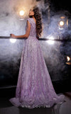 Sequin column evening gown with plunging neckline and fitted silhouette enhanced by elegant overskirt. | Couture Shop LA