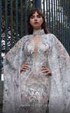 MNM Couture K4025 : Regal Charm in a High-Neck Cape Sleeve Gown.