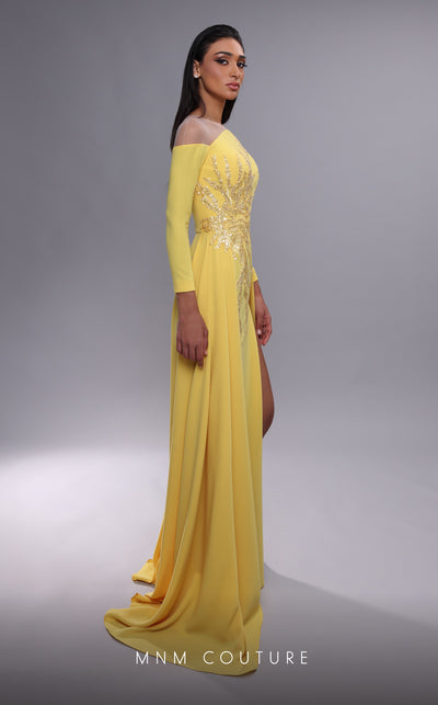 MNM Couture K4089 sheath gown featuring a dramatic overskirt, beading, and high slit. | Couture Shop LA