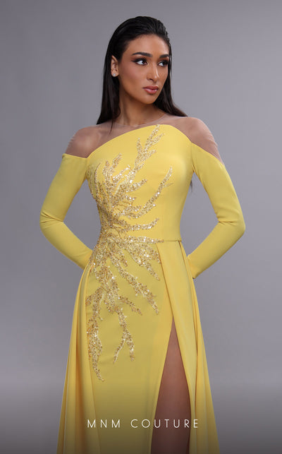 MNM Couture K4089 sheath gown featuring a dramatic overskirt, beading, and high slit. | Couture Shop LA