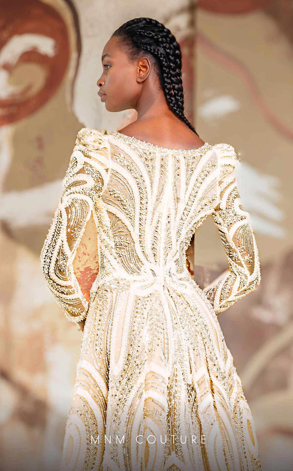 MNM Couture K4148 mesh A-line dress showcasing a bateau neckline and elegant long sleeves. | Couture Shop LA