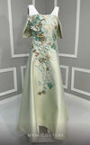 MNM Couture K4217 tea-length dress featuring cap sleeves and beautiful embroidery with sequins and fabric flowers.