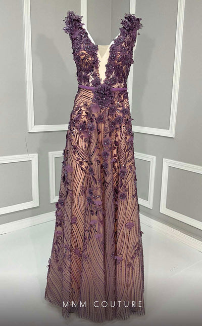 MNM Couture K4222 purple gown with strap sleeves, floral embellishments, and beads detailing. | Couture Shop LA