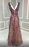 MNM Couture K4222 purple gown with strap sleeves, floral embellishments, and beads detailing. | Couture Shop LA