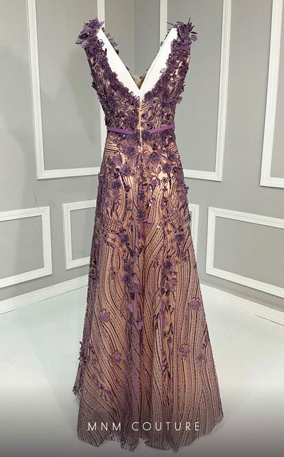 MNM Couture K4222 purple gown with strap sleeves, floral embellishments, and beads detailing. | Couture Shop LA