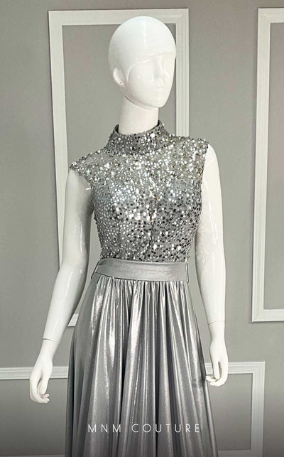 MNM Couture M0085 chiffon gown with flowing cape, beaded bodice, and daring side slits. | Couture Shop LA