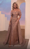 MNM Couture M0100 off-shoulder gown with shirred straps, high slit, and sweeping overskirt.