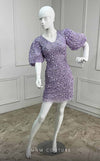 MNM Couture M1037A mini dress with puff sleeves, V neckline, and sequined embellishments.