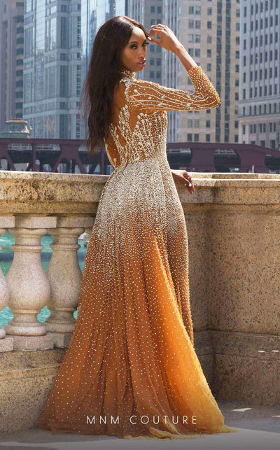 Elevate your evening with the MNM Couture M1127 gown, featuring a lavish design, adorned with sparkling crystals, creating a vision of elegance and luxury. Shop the exclusive piece | Couture Shop LA