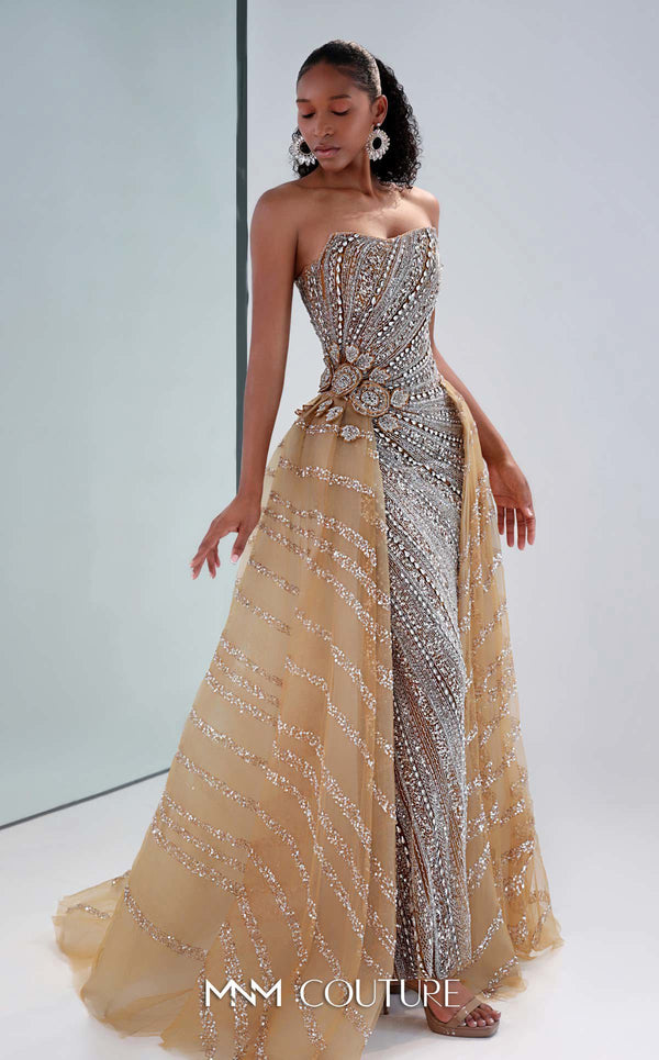 MNM Couture M1186 showcasing a sleeveless, form-fitting mermaid gown fully embellished with sequins, beads, and diamonds, featuring a deep illusion U-neckline. | Couture Shop LA