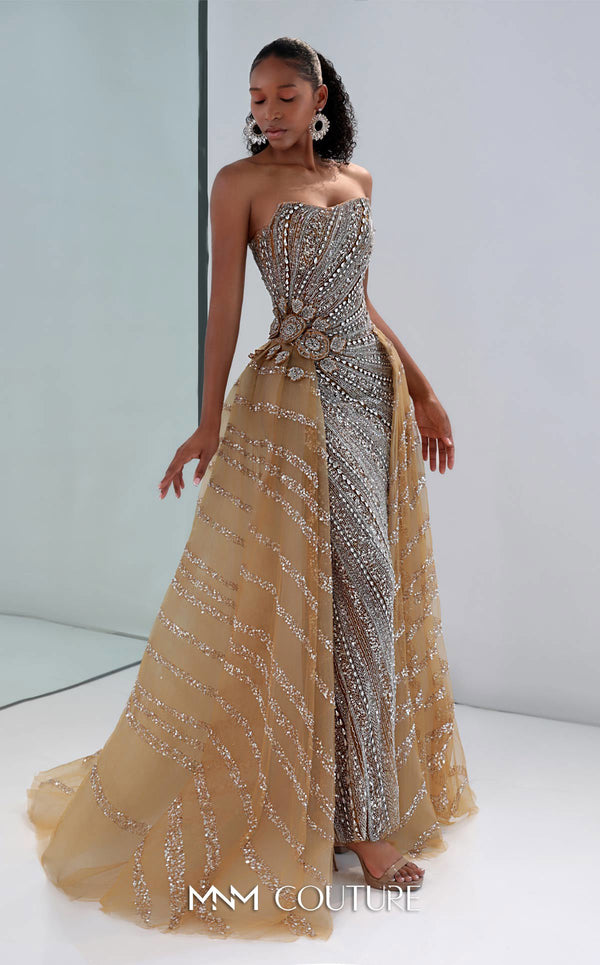 MNM Couture M1186 showcasing a sleeveless, form-fitting mermaid gown fully embellished with sequins, beads, and diamonds, featuring a deep illusion U-neckline. | Couture Shop LA