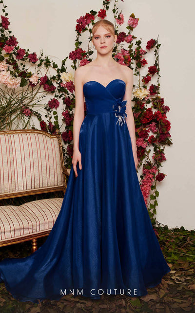 Chiffon A-line evening gown with floral embellishments, sweetheart neckline, and a flowing train. | Couture Shop LA