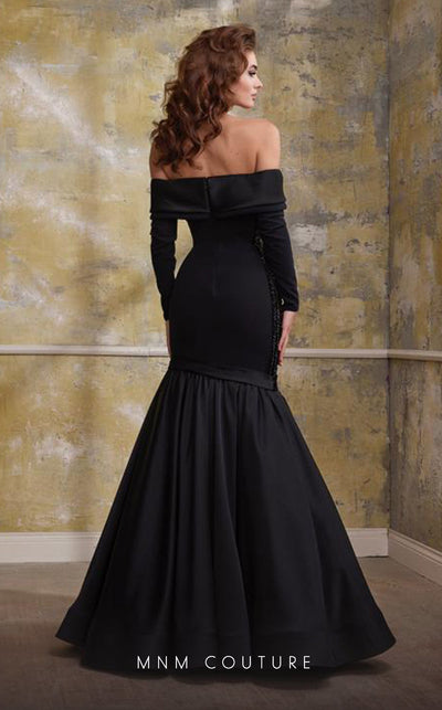 MNM Couture N0563 black mermaid gown with tassel details and draped bust | Couture Shop LA