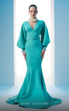 MNM Couture N0605 high V-neck mermaid gown with puffed sleeves.