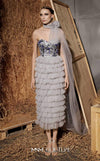 MNM Couture Style N0641 silver column maxi dress with corset-style embroidered bodice, sequins, layered organza skirt, flower-shaped neckline detail, and long train | Couture Shop LA