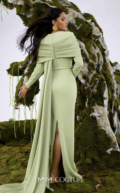 MNM Couture N0672 light green column gown with long-sleeve halter neck, pleated bust, and a single-sided long cape. | Couture Shop LA
