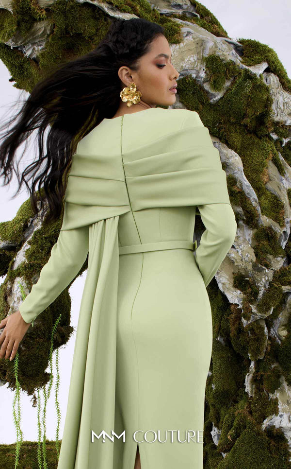 MNM Couture N0672 light green column gown with long-sleeve halter neck, pleated bust, and a single-sided long cape. | Couture Shop LA