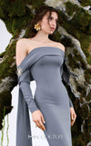 MNM Couture Style N0674 showcasing a brown fitted column gown with straight-across pleated neckline, long sleeves, asymmetrical design, flower brooch, and flowing train | Couture Shop LA