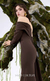 MNM Couture Style N0674 showcasing a brown fitted column gown with straight-across pleated neckline, long sleeves, asymmetrical design, flower brooch, and flowing train | Couture Shop LA