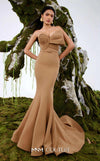 MNM Couture Style N0676 in mocha, showcasing a mermaid silhouette with an asymmetric sweetheart neckline, a half-bow detail on the bust, braided strap accents, and a long train. | Couture Shop LA