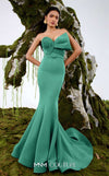MNM Couture Style N0676 in mocha, showcasing a mermaid silhouette with an asymmetric sweetheart neckline, a half-bow detail on the bust, braided strap accents, and a long train. | Couture Shop LA