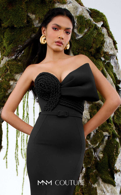 MNM Couture Style N0676 in mocha, showcasing a mermaid silhouette with an asymmetric sweetheart neckline, a half-bow detail on the bust, braided strap accents, and a long train. | Couture Shop LA