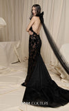MNM Couture Style N0699 halter gown with velvet appliqués, beading, and a large bow with a long train at the back. | Couture Shop LA