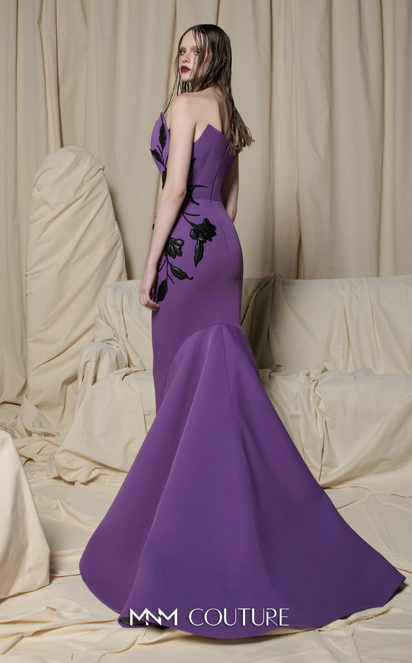 MNM Couture N0700 green and purple crepe column gown with leather floral appliqués, asymmetrical neckline, and trumpet train | Couture Shop LA