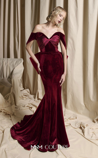 MNM Couture Style N0702 velvet mermaid gown with a sweetheart neckline, structured off-the-shoulder petal sleeves, and a large back bow. | Couture Shop LA
