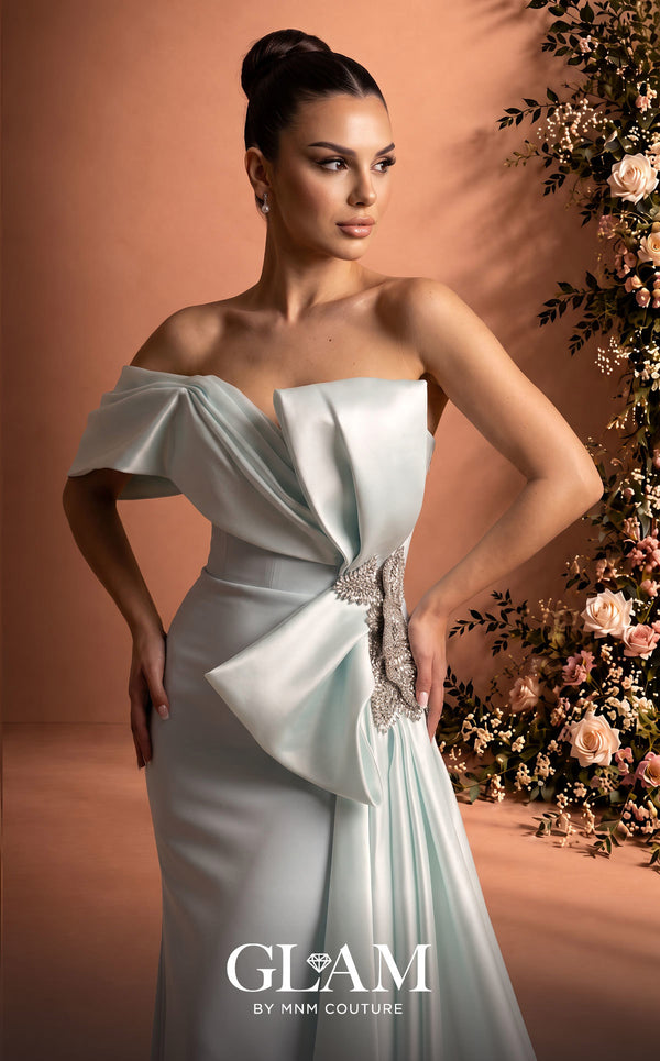 MNM Couture O07802 one-shoulder crepe organza column gown with draped bodice, crystal bow, and side train