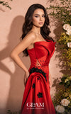 MNM Couture O07840 asymmetric strapless crepe mermaid gown with hand-pleated organza, floral appliqués, and cascading train