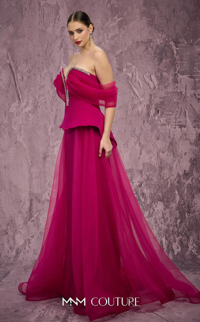 MNM Couture Style Q1010 strapless ballgown with a crystal-embellished deep V-neckline and flowy organza peplum skirt. \Couture Shop LA