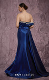 MNM Couture Style Q2414 mermaid gown with a deep V-neckline, embellished bodice, and side train. \ Couture Shop LA
