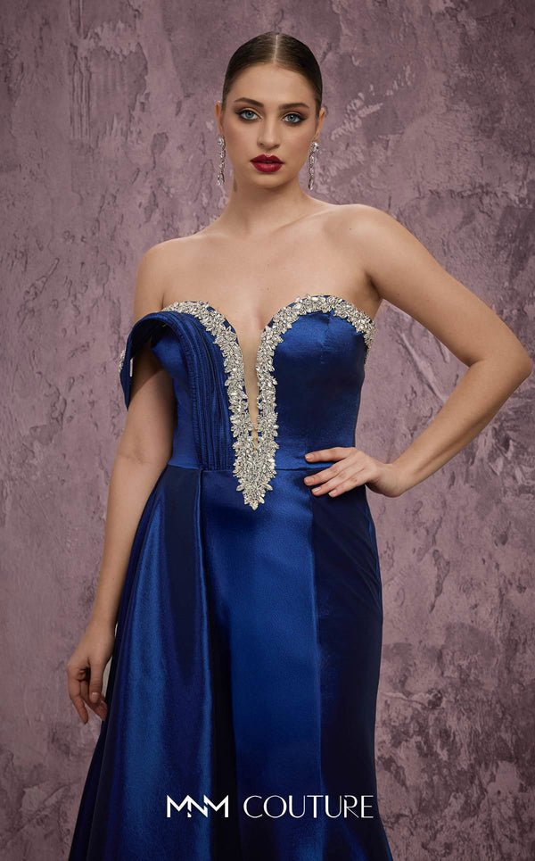MNM Couture Style Q2414 mermaid gown with a deep V-neckline, embellished bodice, and side train. \ Couture Shop LA