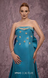 MNM Couture Style Q5574 strapless mermaid gown with rhinestone embellishments and a bow train. \ Couture Shop LA