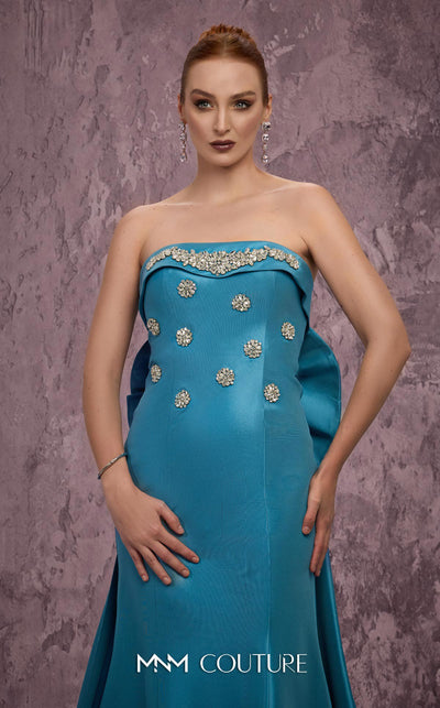 MNM Couture Style Q5574 strapless mermaid gown with rhinestone embellishments and a bow train. \ Couture Shop LA