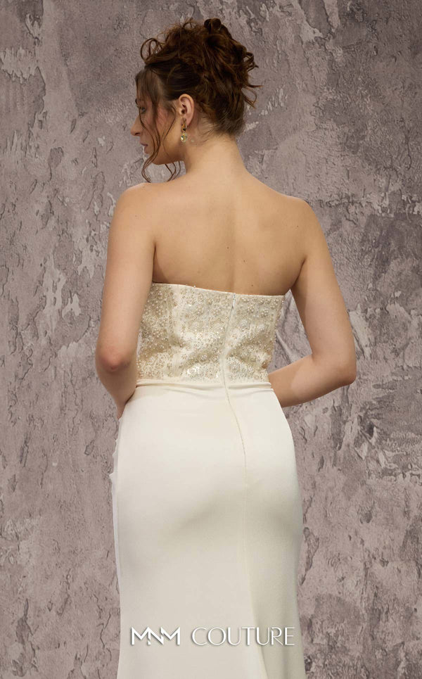 MNM Couture Style Q7545 beaded evening gown with a corseted bodice, ruched hips, and pleated mermaid skirt. \ Couture Shop LA