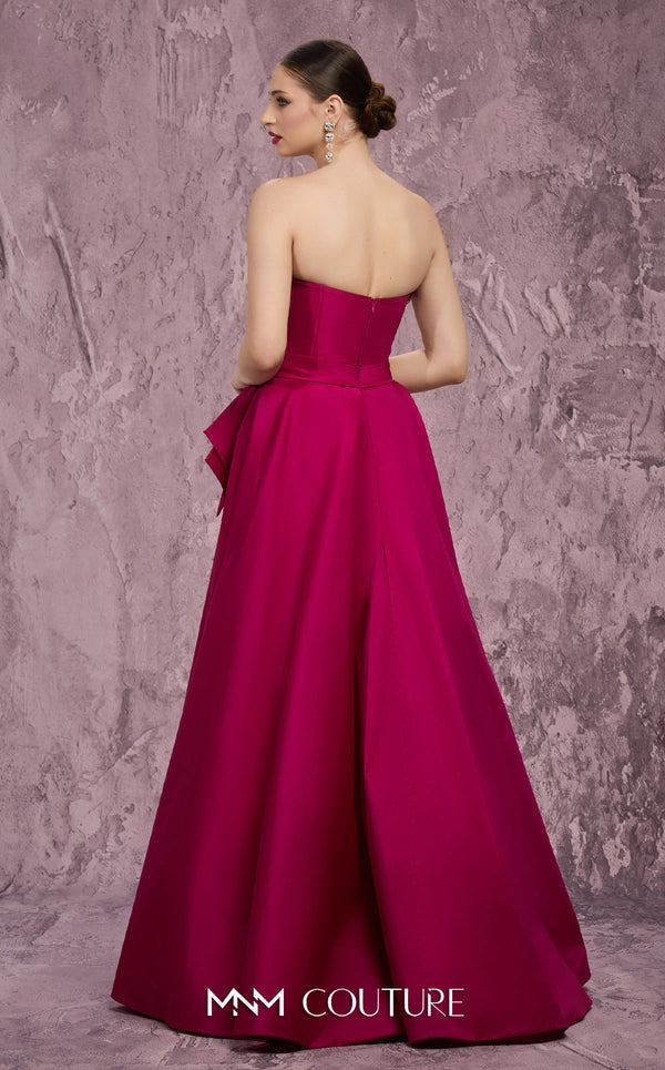 MNM Couture Style Q8017 taffeta A-line gown with a fanned panel, crystal embellishments, and a bow waist. \ Couture Shop LA