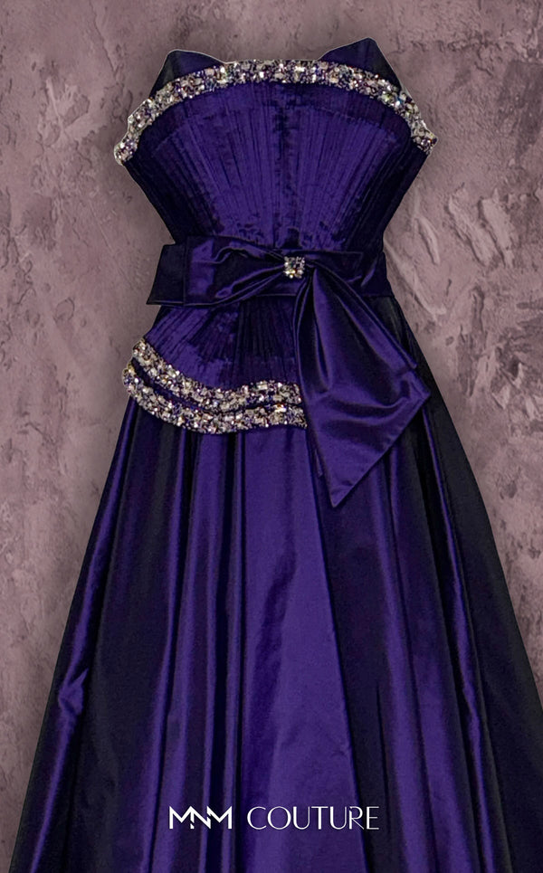 MNM Couture Style Q8017 taffeta A-line gown with a fanned panel, crystal embellishments, and a bow waist. \ Couture Shop LA