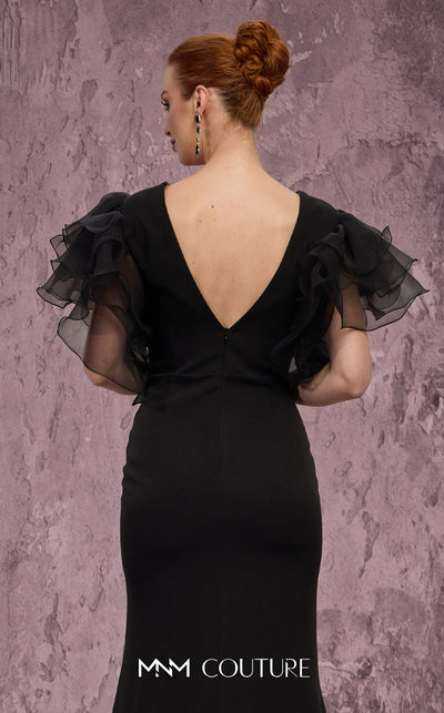 MNM Couture Style Q8022 mermaid gown with ruffled sleeves, mesh neckline, and crystal-embellished slit. \ Couture Shop LA