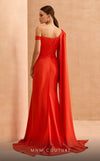 MNM Couture V02029 asymmetrical gown with a long cape skirt and crystal, rhinetones and beads-embellished brooch from waist down to open side slit. | Couture Shop LA