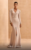 MNM Couture V02030 Rayon Crepe gown with slashed sleeves, refined belt and V-neck. Embellished with rhinestones and crystals.