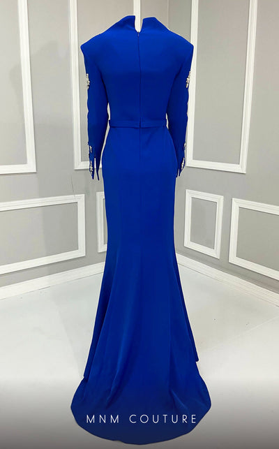 MNM Couture V02030 Rayon Crepe gown with slashed sleeves, refined belt and V-neck. Embellished with rhinestones and crystals. | Couture Shop LA