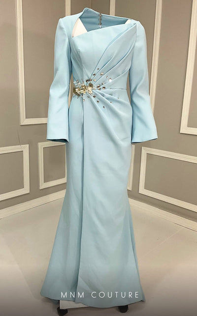MNM Couture V02055 light blue rayon crepe column gown with train, asymmetric neckline, and rhinestones.| Couture Shop LA